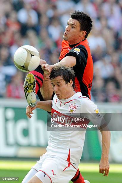 Zlatan Bajramovic of Frankfurt battles for the ball with Stefano Celozzi of Stuttgart during the Bundesliga match between Eintracht Frankfurt and VFB...