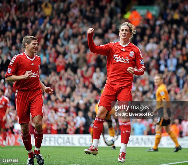 Fernando Torres of Liverpool celebrates after scoring a goal during the Barclays Premier League match between Liverpool and Hull City at Anfield on...