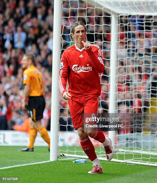 Fernando Torres of Liverpool celebrates after scoring a goal during the Barclays Premier League match between Liverpool and Hull City at Anfield on...