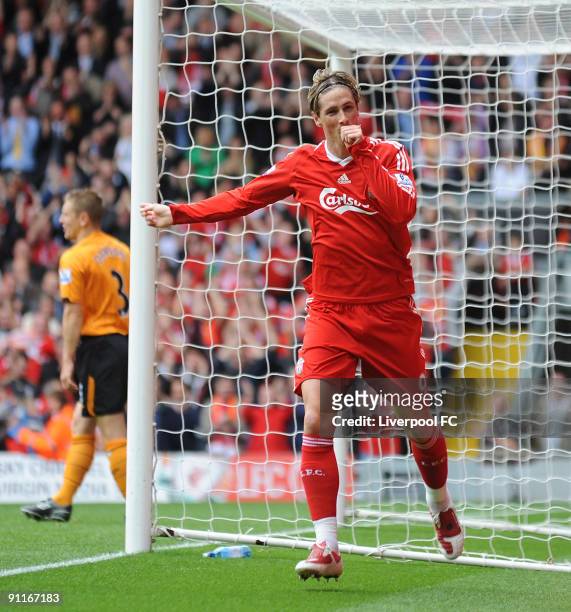 Fernando Torres of Liverpool celebrates after scoring a goal during the Barclays Premier League match between Liverpool and Hull City at Anfield on...