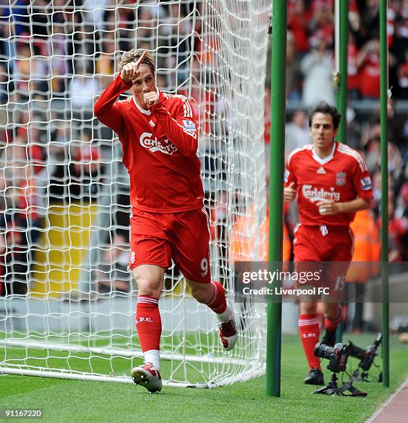 Fernando Torres of Liverpool celebrates after scoring a goal during the Barclays Premier League match between Liverpool and Hull City at Anfield on...