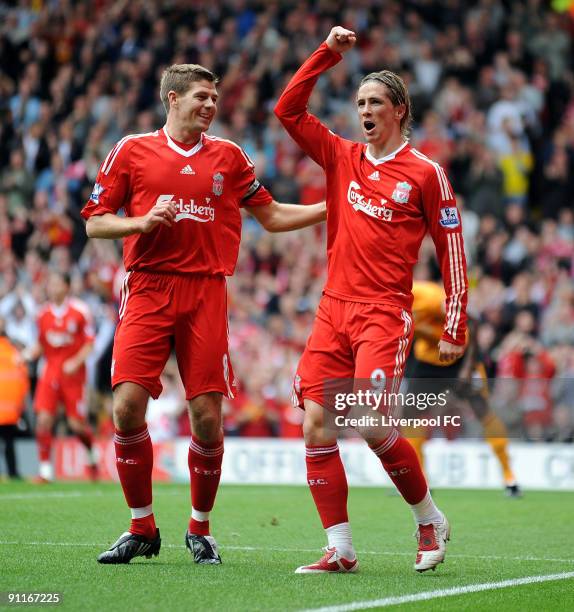 Fernando Torres of Liverpool celebrates after scoring a goal during the Barclays Premier League match between Liverpool and Hull City at Anfield on...