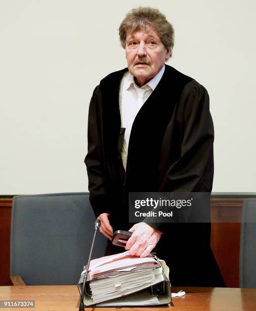 Judge Peter Windgaetter arrives in district court as defendant Sergej W. Stands trial on 28 charges of attempted murder in connection with the BVB...