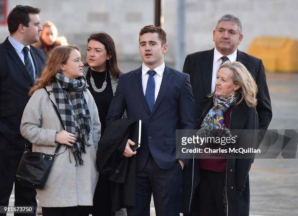 Paddy Jackson arrives at Belfast Laganside courts with family members on January 29, 2018 in Belfast, Northern Ireland. The Ireland and Ulster rugby...
