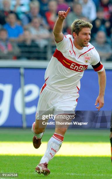 Thomas Hitzlsperger of Stuttgart celebrates after scoring his team's third goal during the Bundesliga match between Eintracht Frankfurt and VFB...