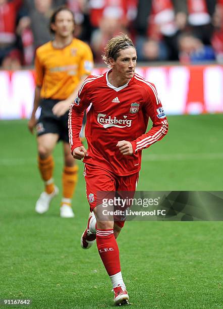 Fernando Torres of Liverpool celebrates after scoring a second goal during the Barclays Premier League match between Liverpool and Hull City at...
