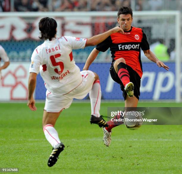 Zlatan Bajramovic of Frankfurt battles for the ball with Serdar Tasci of Stuttgart during the Bundesliga match between Eintracht Frankfurt and VFB...