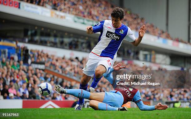 Franco Di Santo of Blackburn is tackled by Stephen Warnock of Aston Villa during the Barclays Premier League match between Blackburn Rovers and Aston...