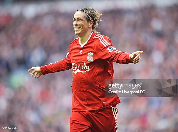 Fernando Torres of Liverpool celebrates after scoring a hat-trick during the Barclays Premier League match between Liverpool and Hull City at Anfield...