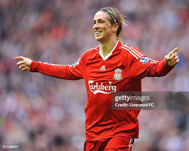 Fernando Torres of Liverpool celebrates after scoring his hat-trick during the Barclays Premier League match between Liverpool and Hull City at...