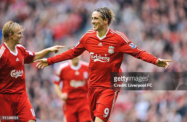 Fernando Torres of Liverpool celebrates after scoring his hat-trick during the Barclays Premier League match between Liverpool and Hull City at...