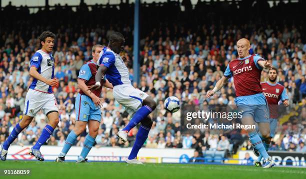 Chris Samba of Blackburn scores to level the game at 1-1 during the Barclays Premier League match between Blackburn Rovers and Aston Villa at Ewood...