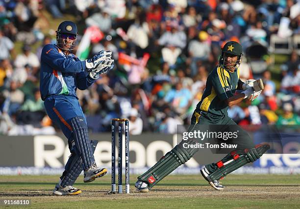 Shoaib Malik of Pakistan hits out during the ICC Champions Trophy group A match between India and Pakistan at Centurion on September 26, 2009 in...