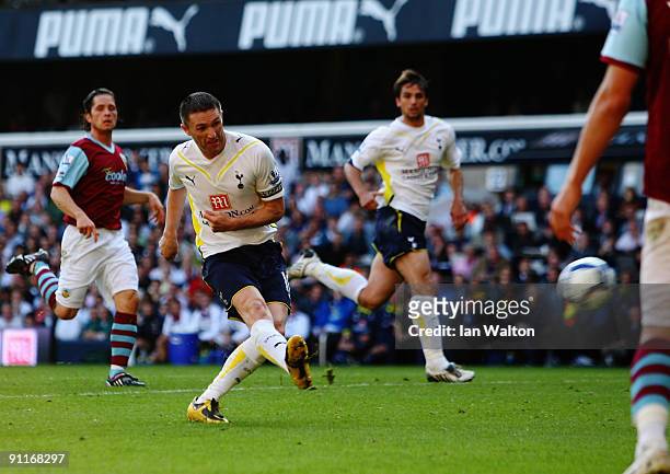 Robbie Keane of Tottenham Hotspur scores his second goal during the Barclays Premier League match between Tottenham Hotspur and Burnley at White Hart...