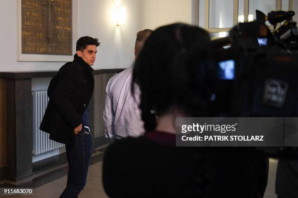 Borussia Dortmund's Spanish defender Marc Bartra leaves after he testified in the trial of Sergej W., a man suspected of detonating three bombs...