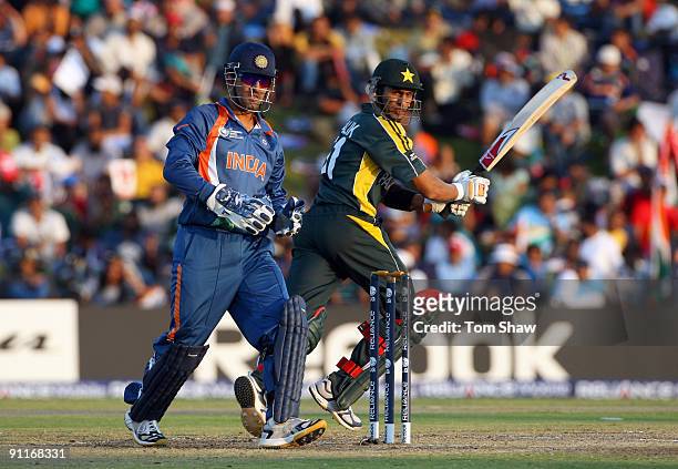 Shoaib Malik of Pakistan hits out during the ICC Champions Trophy group A match between India and Pakistan at Centurion on September 26, 2009 in...