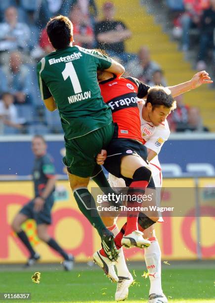 Goalkeeper Oka Nikolov in action with Chris of Frankfurt during the Bundesliga match between Eintracht Frankfurt and VFB Stuttgart at Commerzbank...