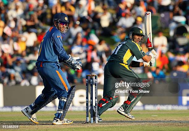 Shoaib Malik of Pakistan hits out during the ICC Champions Trophy group A match between India and Pakistan at Centurion on September 26, 2009 in...