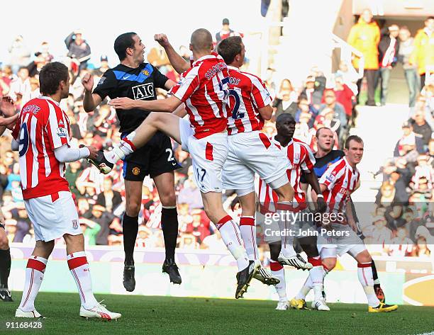 John O'Shea of Manchester United scores their second goal during the Barclays FA Premier League match between Stoke CIty and Manchester United at...