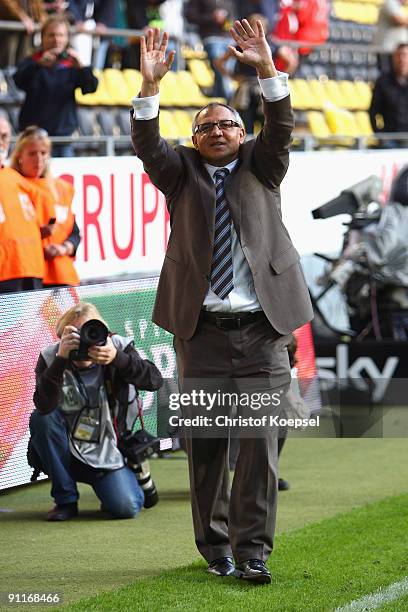 Head coach Felix Magath of Schalke celebrates the 1-0 victory with the fans after the Bundesliga match between Borussia Dortmund and FC Schalke 04 at...