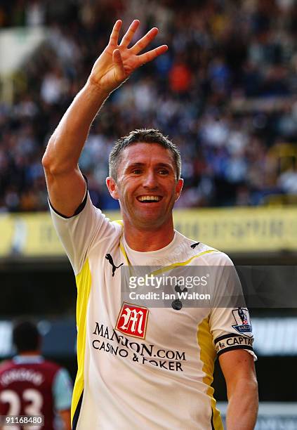 Robbie Keane of Tottenham Hotspur celebrates his fourth goal during the Barclays Premier League match between Tottenham Hotspur and Burnley at White...