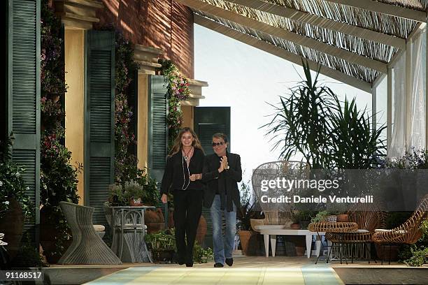 Italian designer Roberto Cavalli and his wife Eva acknowledge the applause after the Roberto Cavalli show as part of Milan Womenswear Fashion Week...