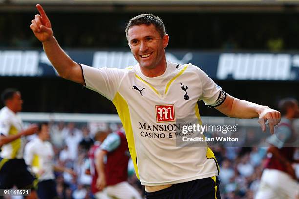 Robbie Keane of Tottenham Hotspur celebrates his fourth goal during the Barclays Premier League match between Tottenham Hotspur and Burnley at White...