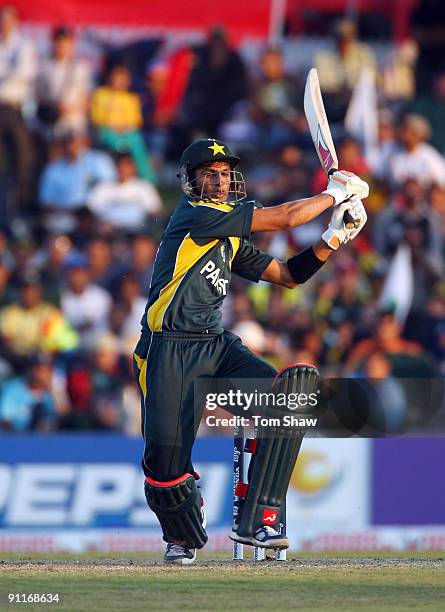 Shoaib Malik of Pakistan hits out during the ICC Champions Trophy group A match between India and Pakistan at Centurion on September 26, 2009 in...