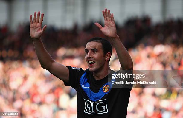 John O'Shea of Manchester Unted celebrates his goal during the Barclays Premier League match between Stoke City and Manchester United at the...