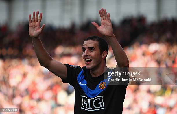 John O'Shea of Manchester Unted celebrates his goal during the Barclays Premier League match between Stoke City and Manchester United at the...