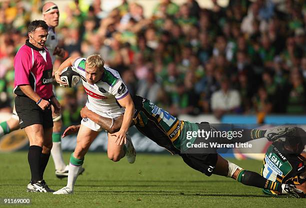 Jonny Hepworth of Leeds is tackled by Courtney Lawes of Northampton during the Guinness Premiership match between Northampton Saints and Leeds...