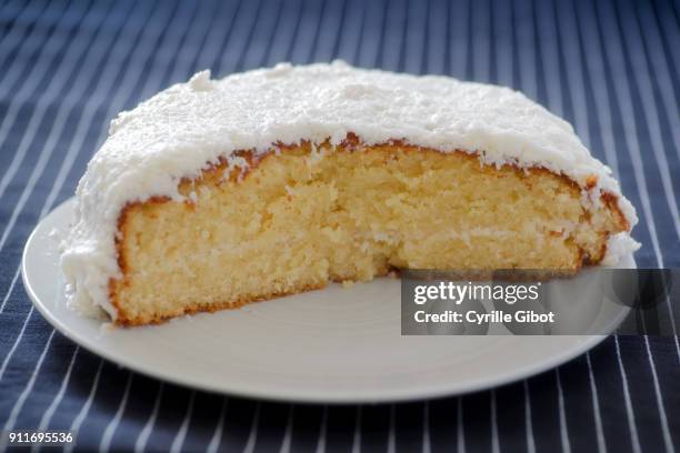 homemade coconut cream cake on a plate - coconut cream stock pictures, royalty-free photos & images