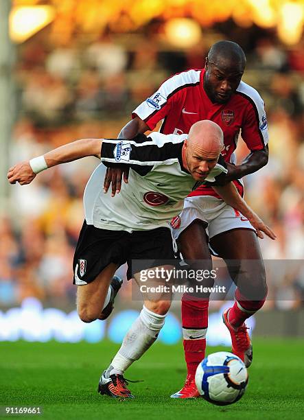 Andrew Johnson of Fulham battles with William Gallas of Arsenal during the Barclays Premier League match between Fulham and Arsenal at Craven Cottage...