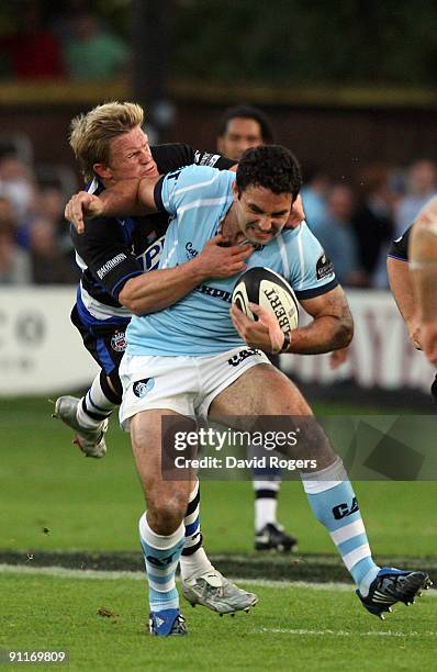 Jeremy Staunton of Leicester is tackled by Michael Claassens during the Guinness Premiership match between Bath and Leicester Tigers at the...