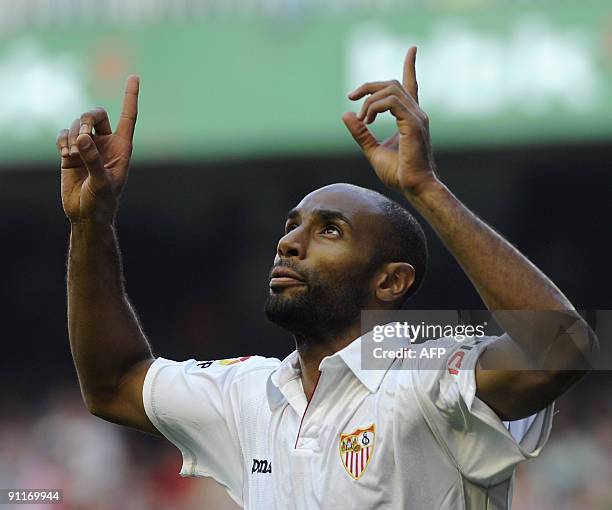 French forward Frederic Kanoute celebrates after scoring his team's third goal during a Spanish league football match against Athletic Bilbao on...