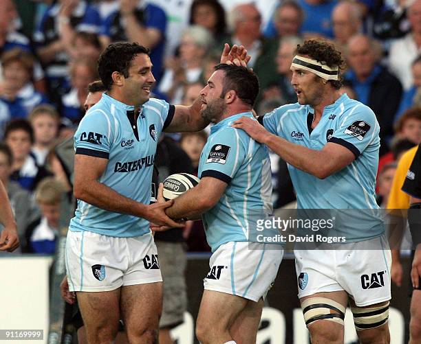 Mefin Davies of Leicester is congratulated by team mates Jeremy Staunton and Craig Newby after scoring the first try during the Guinness Premiership...