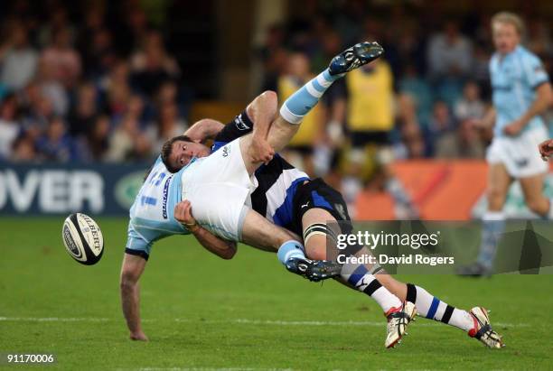 Geordan Murphy of Leicester is tackled by Julian Salvi during the Guinness Premiership match between Bath and Leicester Tigers at the Recreation...