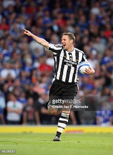 Kevin Nolan celebrates after scoring his team's fourth goal during the Coca-Cola Championship match between Ipswich Town and Newcastle United at...