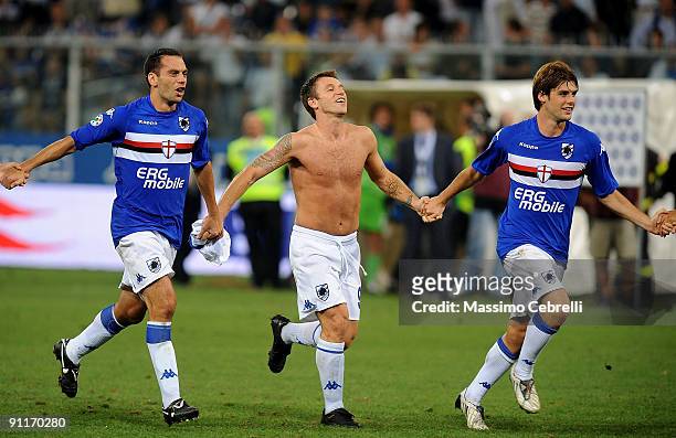 Luciano Zauri, Antonio Cassano and Andrea Poli of UC Sampdoria celebrate victory after the Serie A match between UC Sampdoria and FC Inter Milan at...