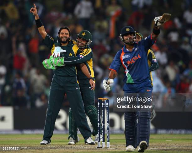 Shahid Afridi of Pakistan celebrates taking the wicket of Virat Kohli of India during the ICC Champions Trophy group A match between India and...