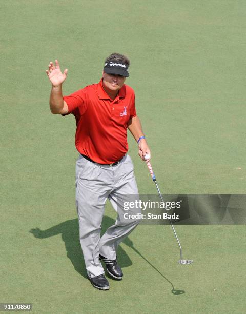 Kenny Perry exits the 18th green during the third round of THE TOUR Championship presented by Coca-Cola, the final event of the PGA TOUR Playoffs for...