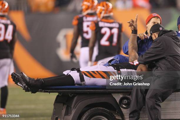 Vontaze Burfict of the Cincinnati Bengals is taken from the field on a stretcher after suffering a head injury during the game against the Pittsburgh...