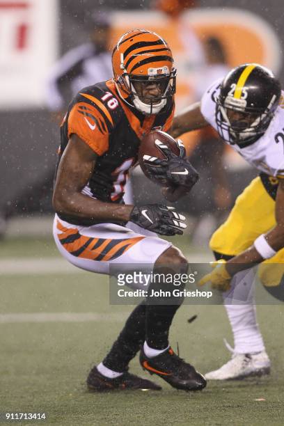 Green of the Cincinnati Bengals runs the football upfield during the game against the Pittsburgh Steelers at Paul Brown Stadium on December 4, 2017...