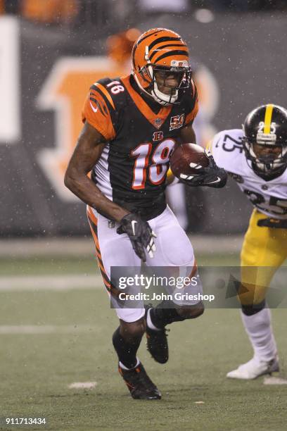 Green of the Cincinnati Bengals runs the football upfield during the game against the Pittsburgh Steelers at Paul Brown Stadium on December 4, 2017...