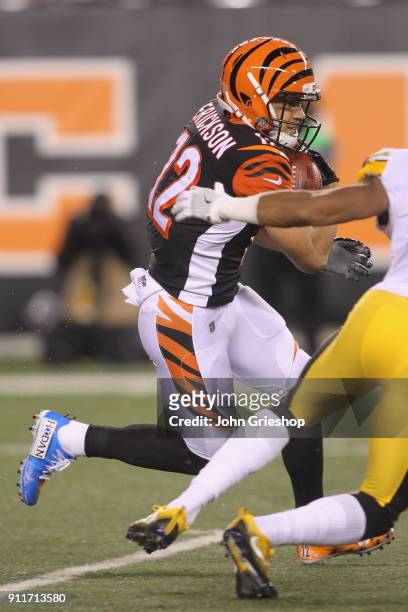 Alex Erickson of the Cincinnati Bengals runs the football upfield during the game against the Pittsburgh Steelers at Paul Brown Stadium on December...