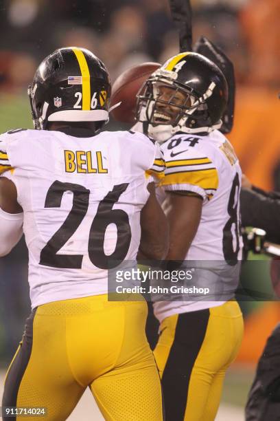 Antonio Brown and Le'Veon Bell of the Pittsburgh Steelers celebrate a touchdown during the game against the Cincinnati Bengals at Paul Brown Stadium...