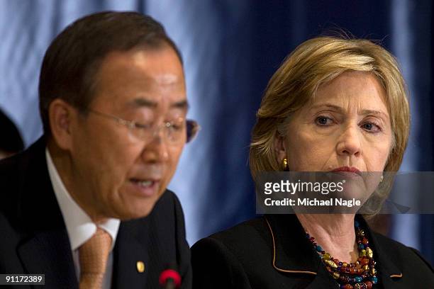 Secretary of State Hillary Clinton listens to UN Secretary-General Ban Ki-moon at a meeting they co-hosted on food security at United Nations...