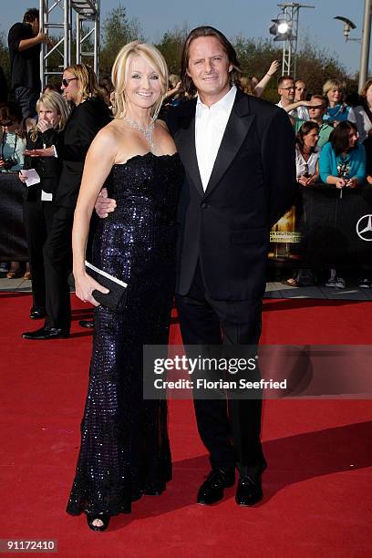 Host Frauke Ludowig and husband Kai Roeffen arrive for the German TV Award 2009 at the Coloneum on September 26, 2009 in Cologne, Germany.