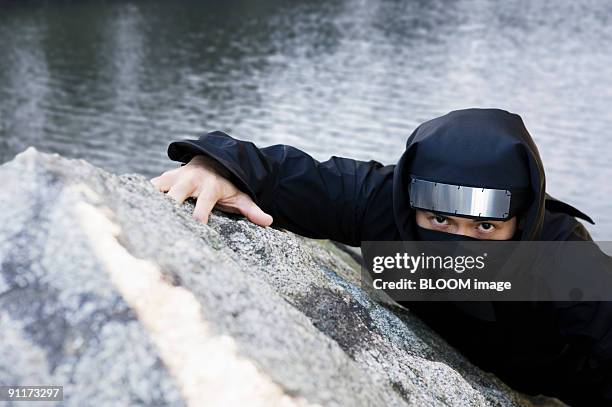 Ninja Falling Rocks Climbing Wall Funny Photos and Premium High Res Pictures - Getty Images