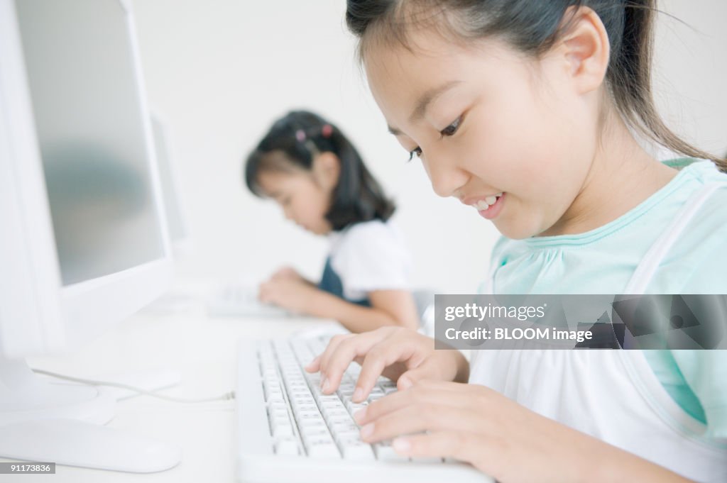Students Using Computers In Classroom Side View High-Res Stock Photo ...